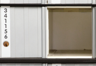 Image of the Small PO Box, Size 2, seen open and empty.